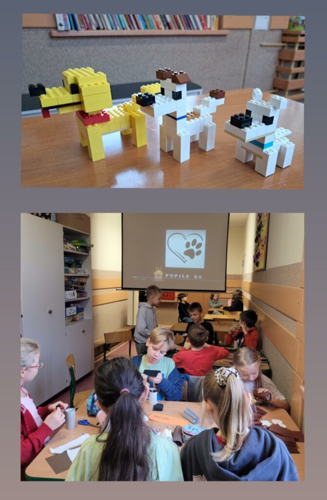 Zdj臋cie sk艂ada si臋 z kola偶u 2 zdj臋膰. Oba zdj臋cia umieszczone s膮 na szarym tle. Na zdj臋ciu nr 1 widoczne s膮 3 psy zrobione z klock贸w Lego, dwa bia艂e i jeden 偶贸艂ty. Wszystkie pieski stoj膮 na br膮zowym, drewnianym blacie, w tle mo偶na dostrzec stoj膮ce na drewnianym parapecie kolorowe ksi膮偶ki oraz szar膮 艣cian臋 i bia艂o- szar膮 艂aw臋 do siedzenia. Na zdj臋ciu nr 2 widocznych jest 12 dzieci, 6 ch艂opc贸w i 6 dziewczynek. 11 z nich siedzi przy 3 drewnianych stolikach na krzes艂ach, jeden ch艂opiec stoi przy 艣rodkowym stoliku z jego lewej strony. Dzieci wykonuj膮 prace plastyczn膮 z rolek po papierze toaletowym, u偶ywaj膮 przy tym no偶yczek. Na pierwszym stoliku le偶膮 przybory szkole, pi贸rnik oraz kolorowe kartki papieru. Po lewej stronie widoczna jest du偶a, szara szafa, na kt贸rej stoj膮 r贸偶nego rodzaju gry planszowe oraz kawa艂ek bia艂o- szarej 艣ciany z dwiema drewnianymi deskami wzd艂u偶, po lewej stronie szaro- bia艂a 艣ciana z br膮zowymi dwiema deskami, a w tle opuszczony ekran rzutnika i wy艣wietlone na nim serce z 艂ap膮.