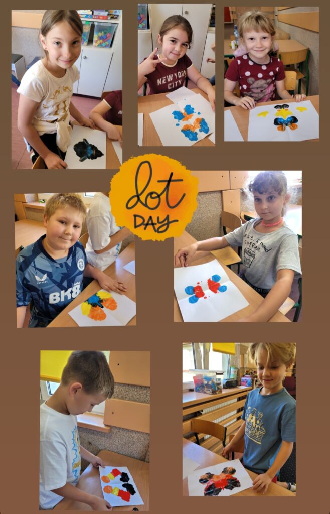 Zdjęcie to kolaż 7 zdjęć na brązowym tle. Na 4 zdjęciach są dziewczynki na 3 chłopcy. Dzieci uśmiechają się i prezentują swoje prace plastyczne- kolorowe motyle z kropek. Na środku zdjęć napis na pomarańczowym tle "dot day".