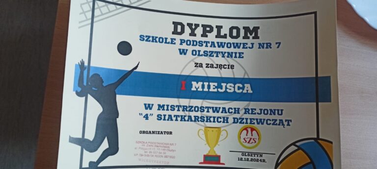 zdjęcie dyplomu za zajęcie 1 miejsca w mistrzostwach rejonowych "4" siatkarskich dziewczyn. dyplom jest koloru niebieskiego